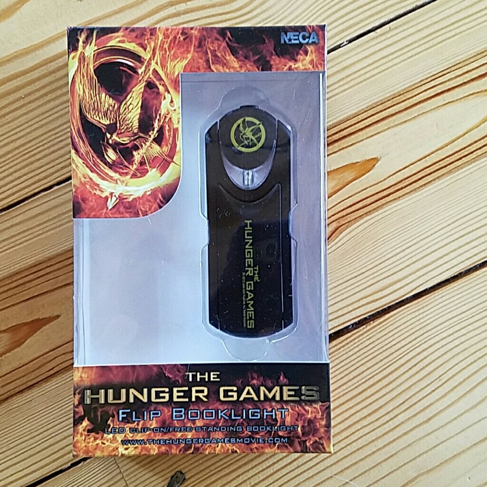 The Hunger Games Mockingjay Flipping Booklight NWT