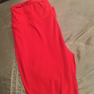 Used OS Lularoe leggings. Solid Coral