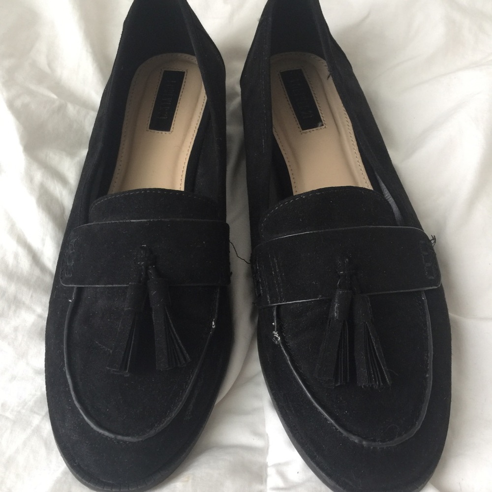 Black loafers, flats