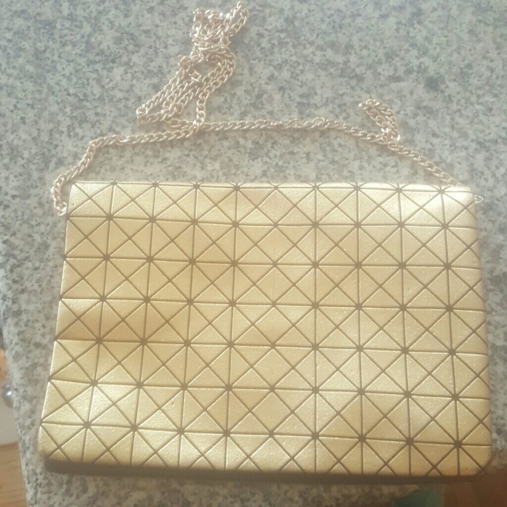 Gold crossbody clutch