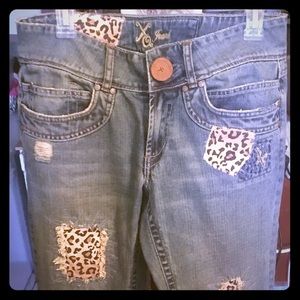 XOXO CHEETAH FLARE JEANS
