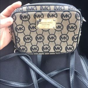 Authentic MK cross body FIRM on price.