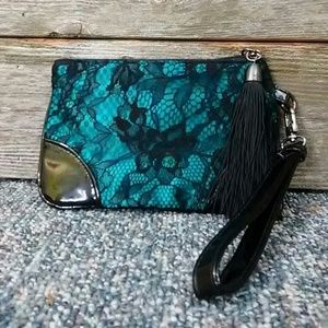 Blue/green handbag with black flower embroidery