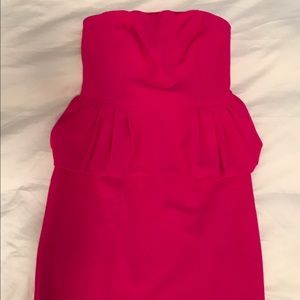 Strapless magenta peplum dress