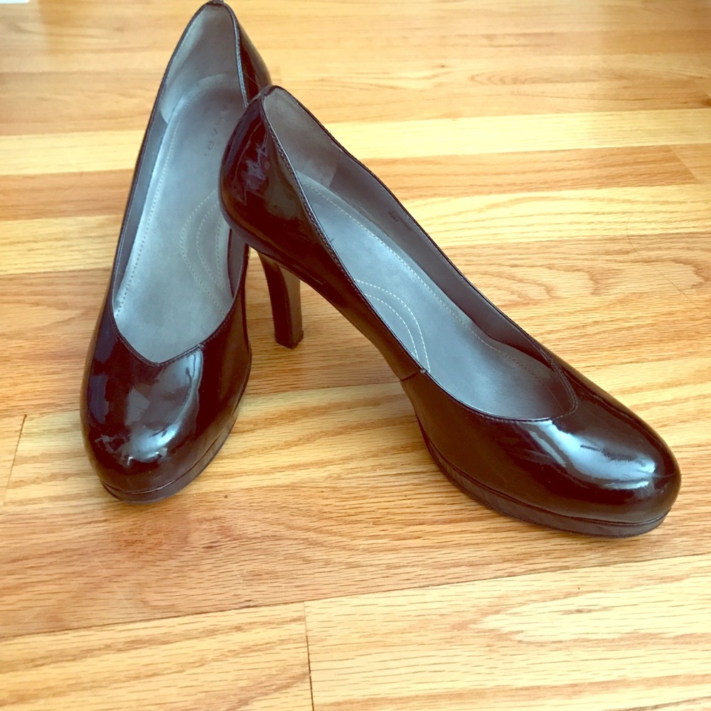 Black patten leather pumps