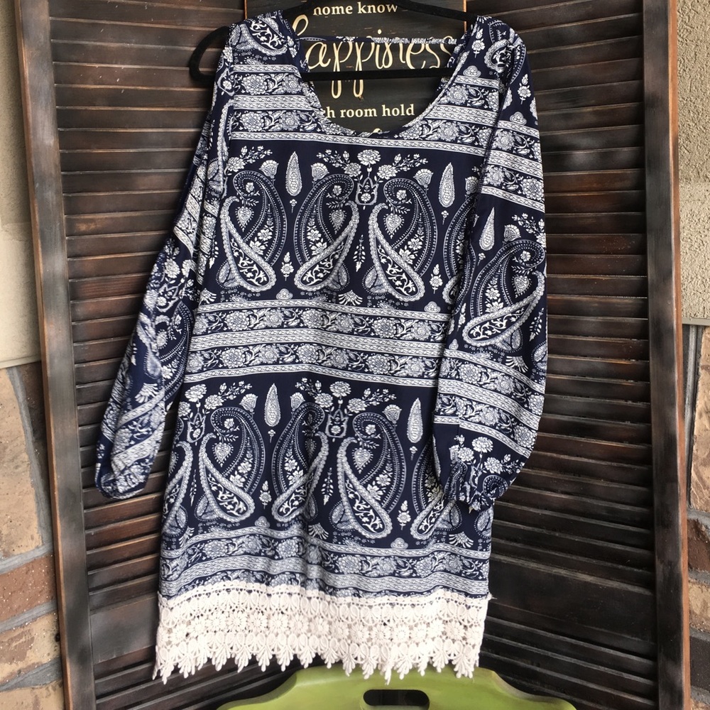Silky blue and creamy white long sleeve dress.