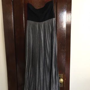 Strapless dress with pleated skirt