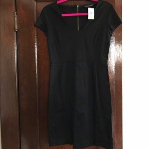 Fitted, black mini dress