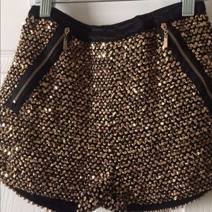 Gold and black shorts