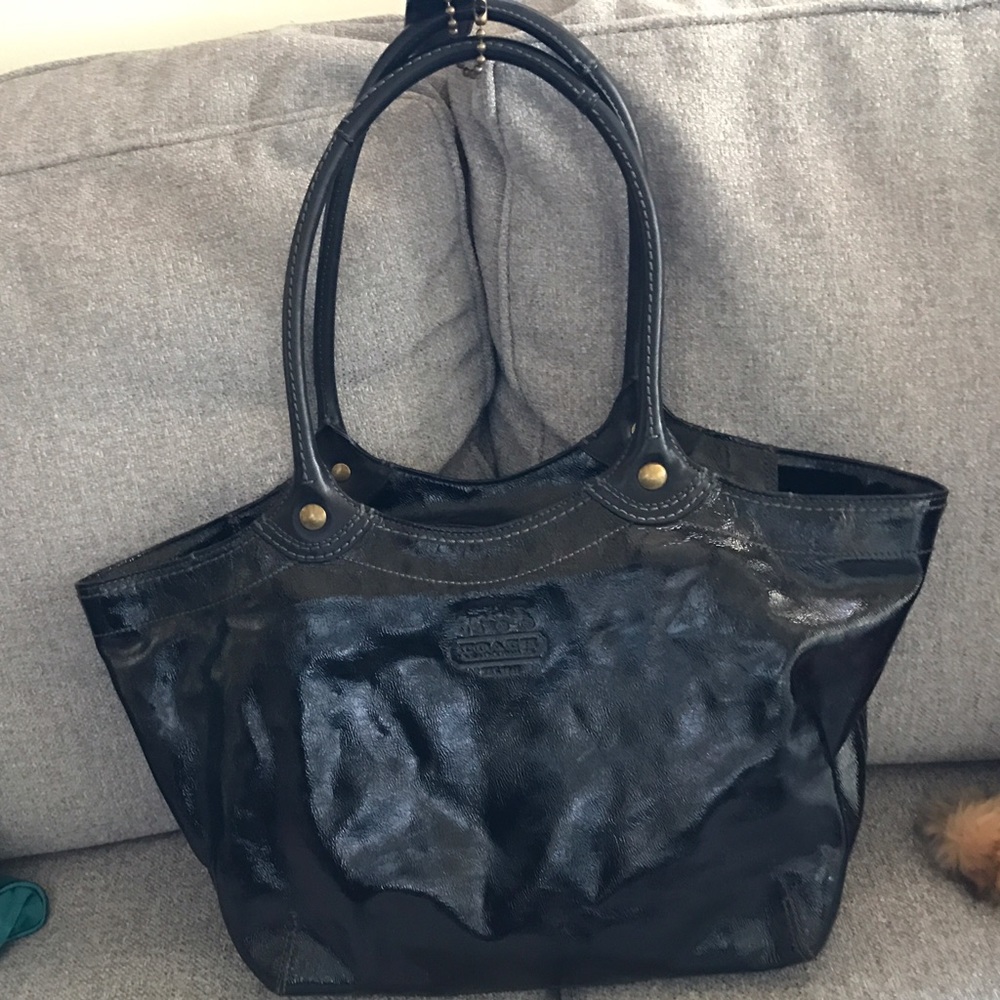 Black patent leather Coach bag.