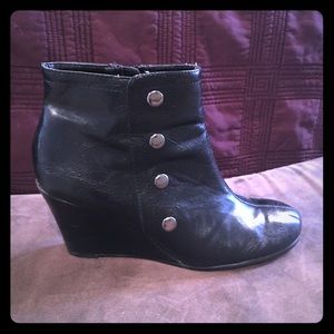 Black wedge booties