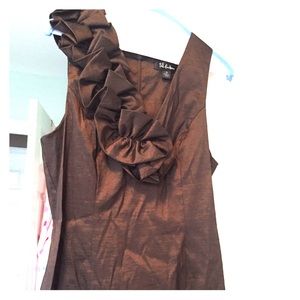Chocolate brown dress with a ruffle on shoulder