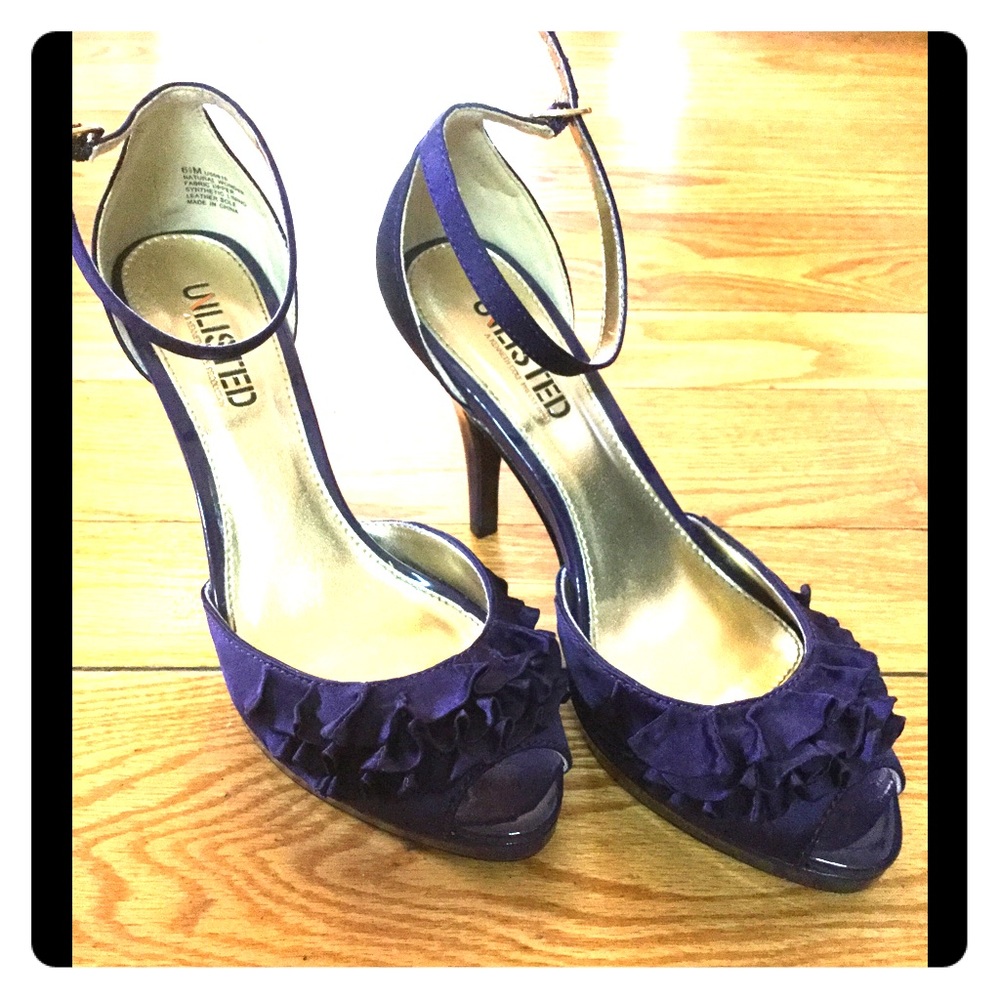 Purple high-heeled shoes. Women's size 6 1/2.