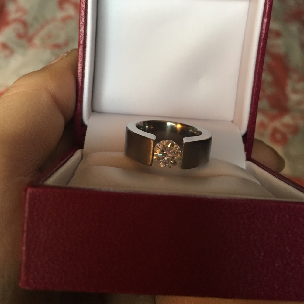 Round white sapphire and 14k white gold ring