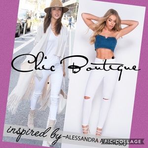 Knee ripped white jeans