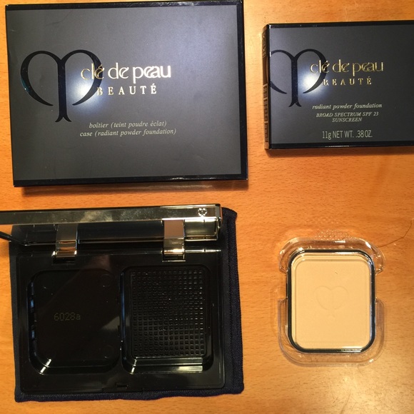 Cle De Peau Beaute Other - NEVER USED Cle De Peau Powder foundation/case