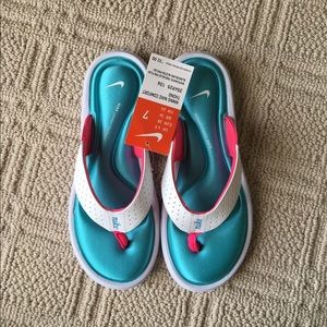 Size seven blue women's Nike flip flops