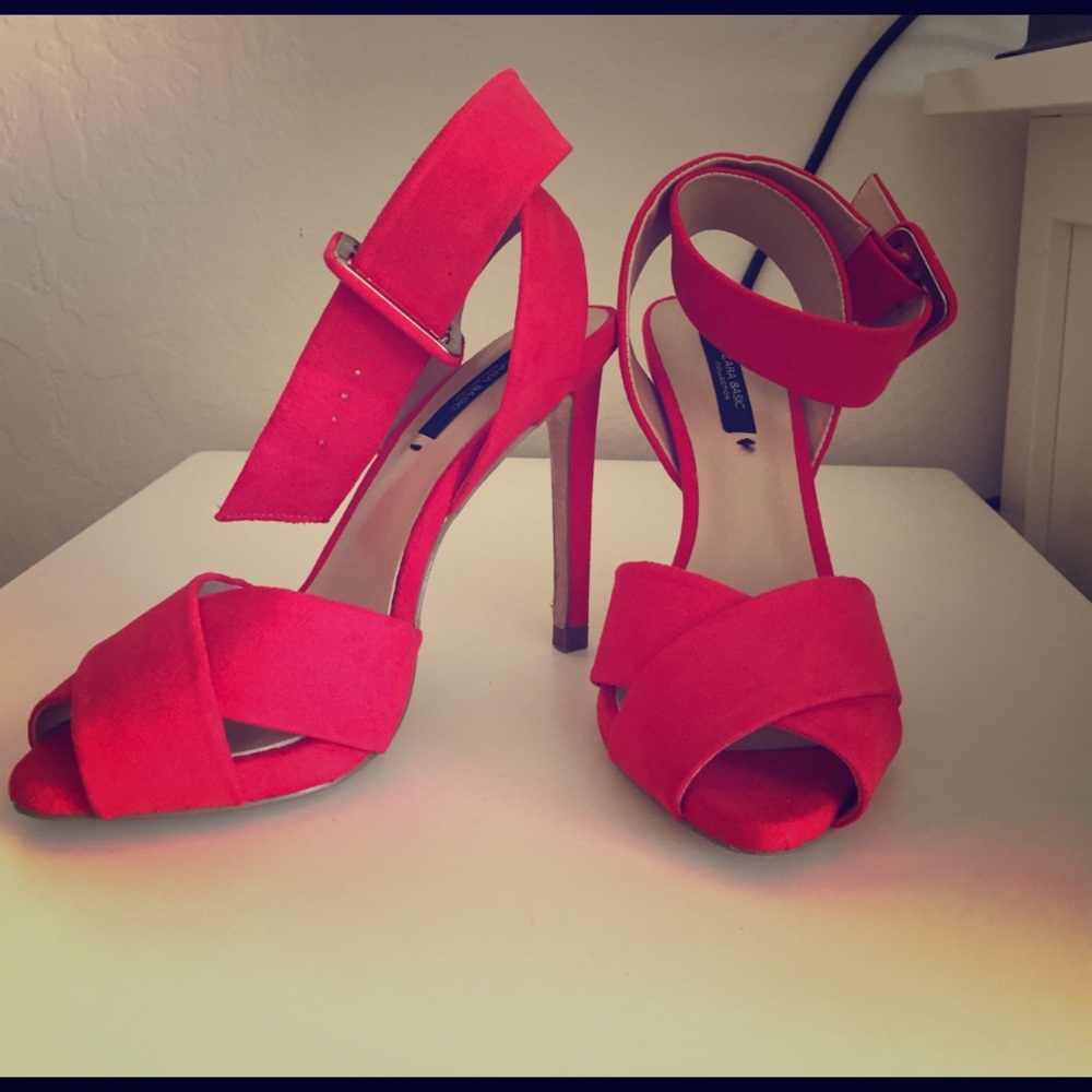 Bright red open toe pumps