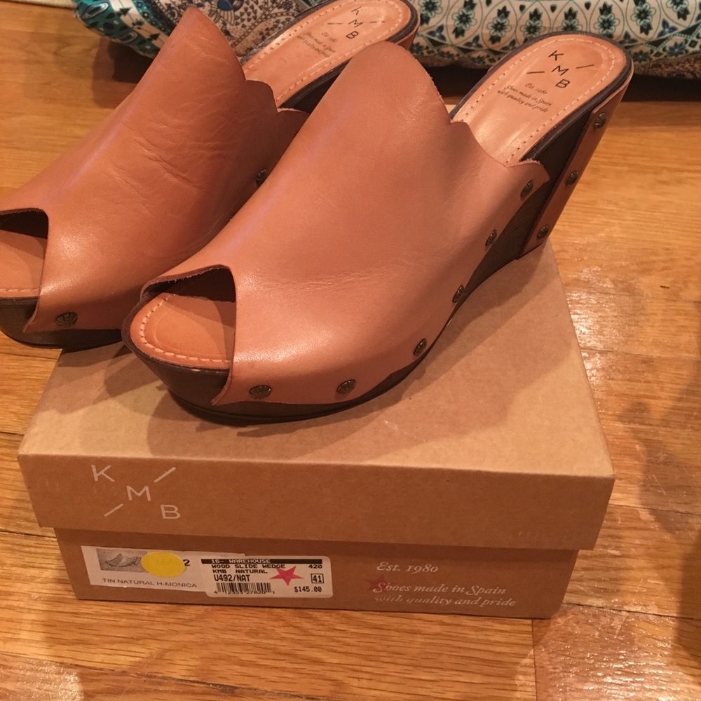 Natural color camel like color clogs wedges.
