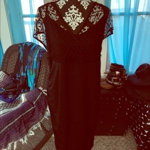 Black and lace sleeve dress. Plus size