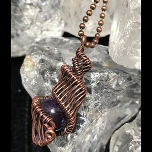 Copper spiral pendant with genuine amethyst bead
