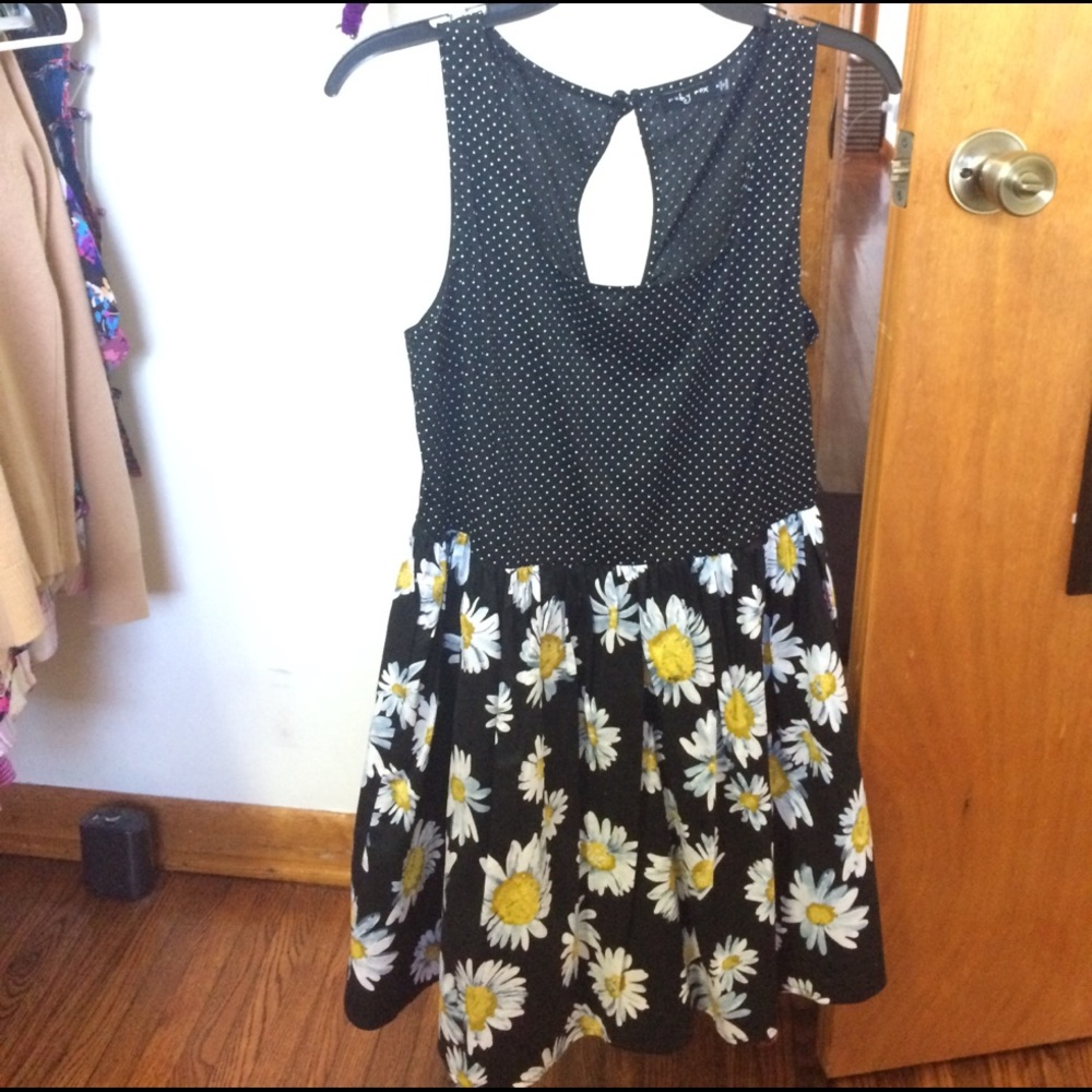 Black dress with sunflower and polka dot pattern