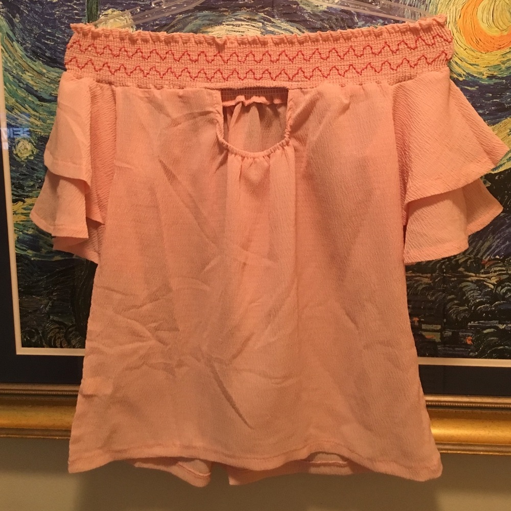 Shoulder baring blouse