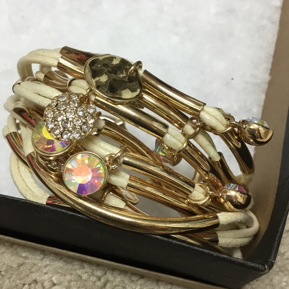 Gold tone & leather bracelet with pretty charms