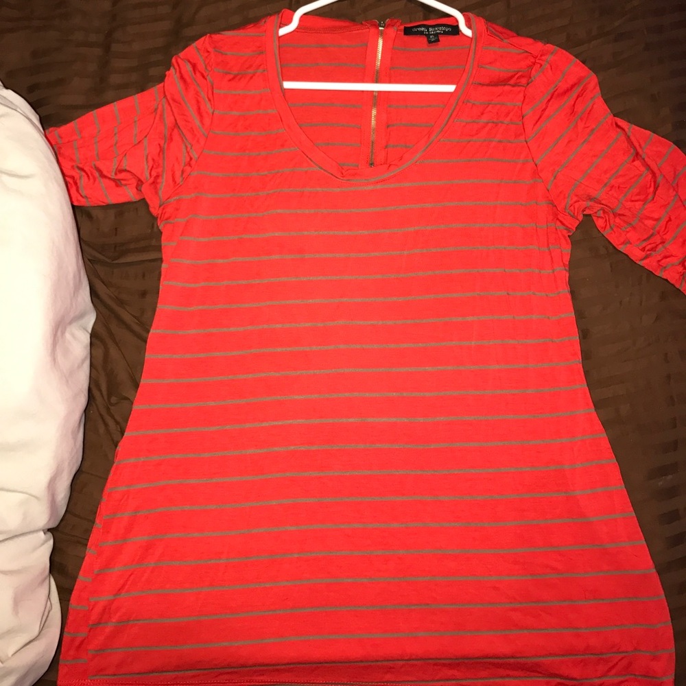 Three quarter length sleeve shirt.