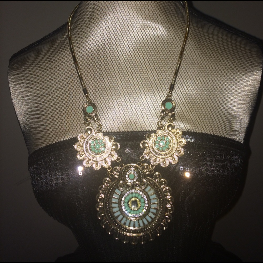 Gold and sea foam green statement necklace.