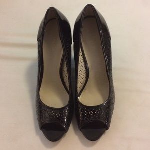 Patent leather black Nine West peep toe wedges