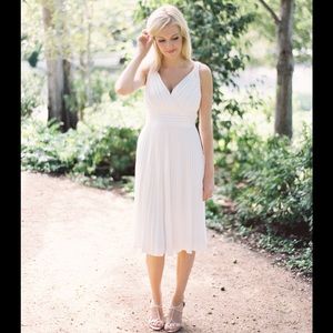 White pleated dress