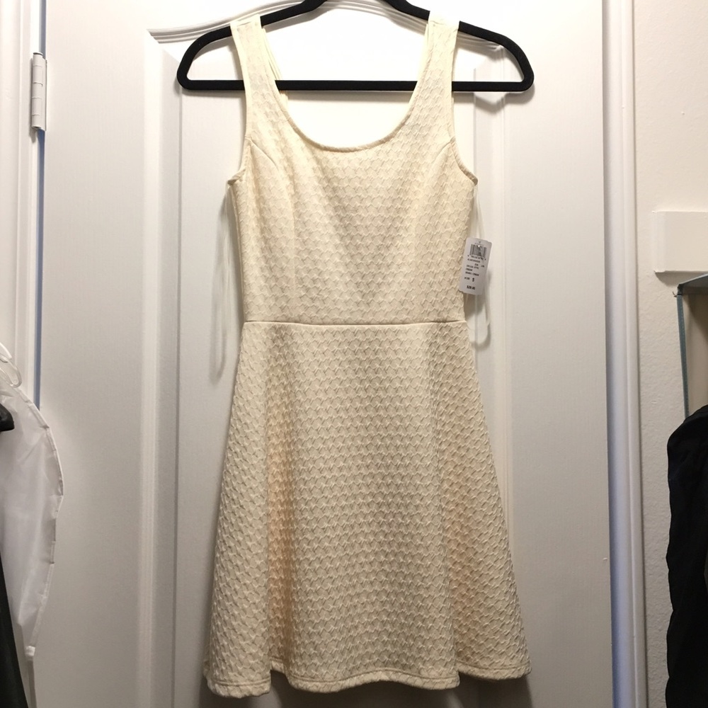 NEVER BEFORE WORN Windsor A-line, open back dress