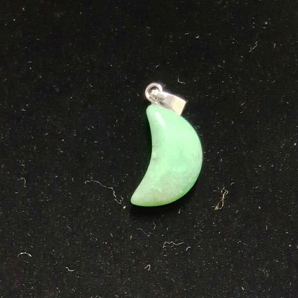 Beautiful jade colored stone pendant