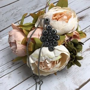 Silver necklace smoke colored