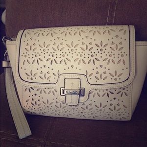 Coach eyelet wristlet/clutch