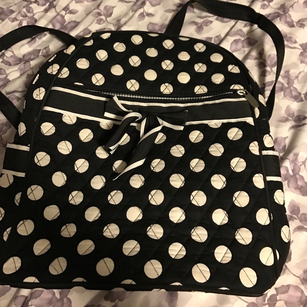 Black polkadot backpack