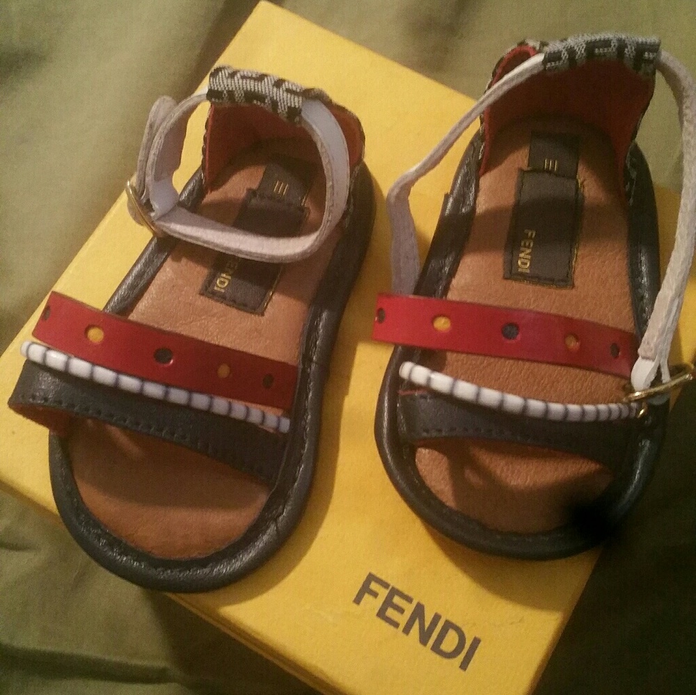 Baby Fendi sandals and infant Burberry shirt