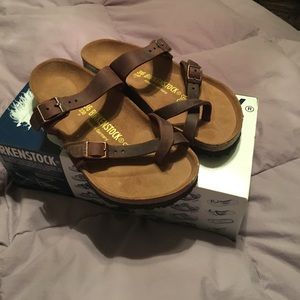 Birkenstock sandals,brown leather. Never worn
