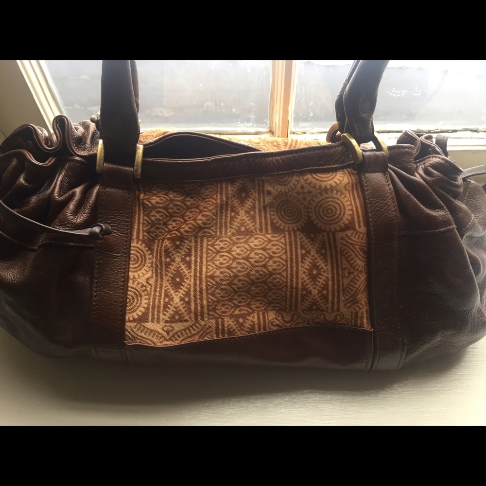 Occhio leather handbag with fur detail.