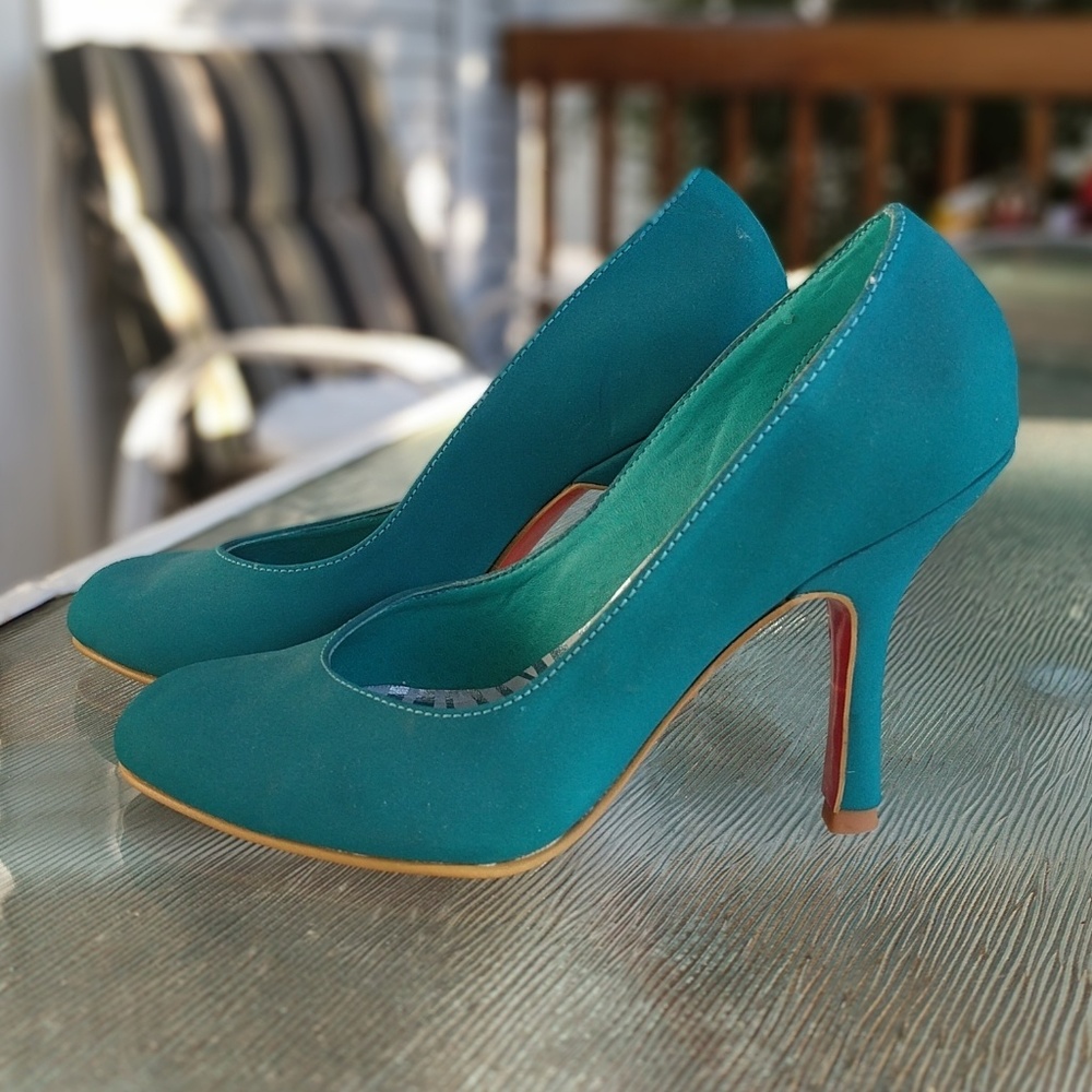 Blue heels, random red bottoms
