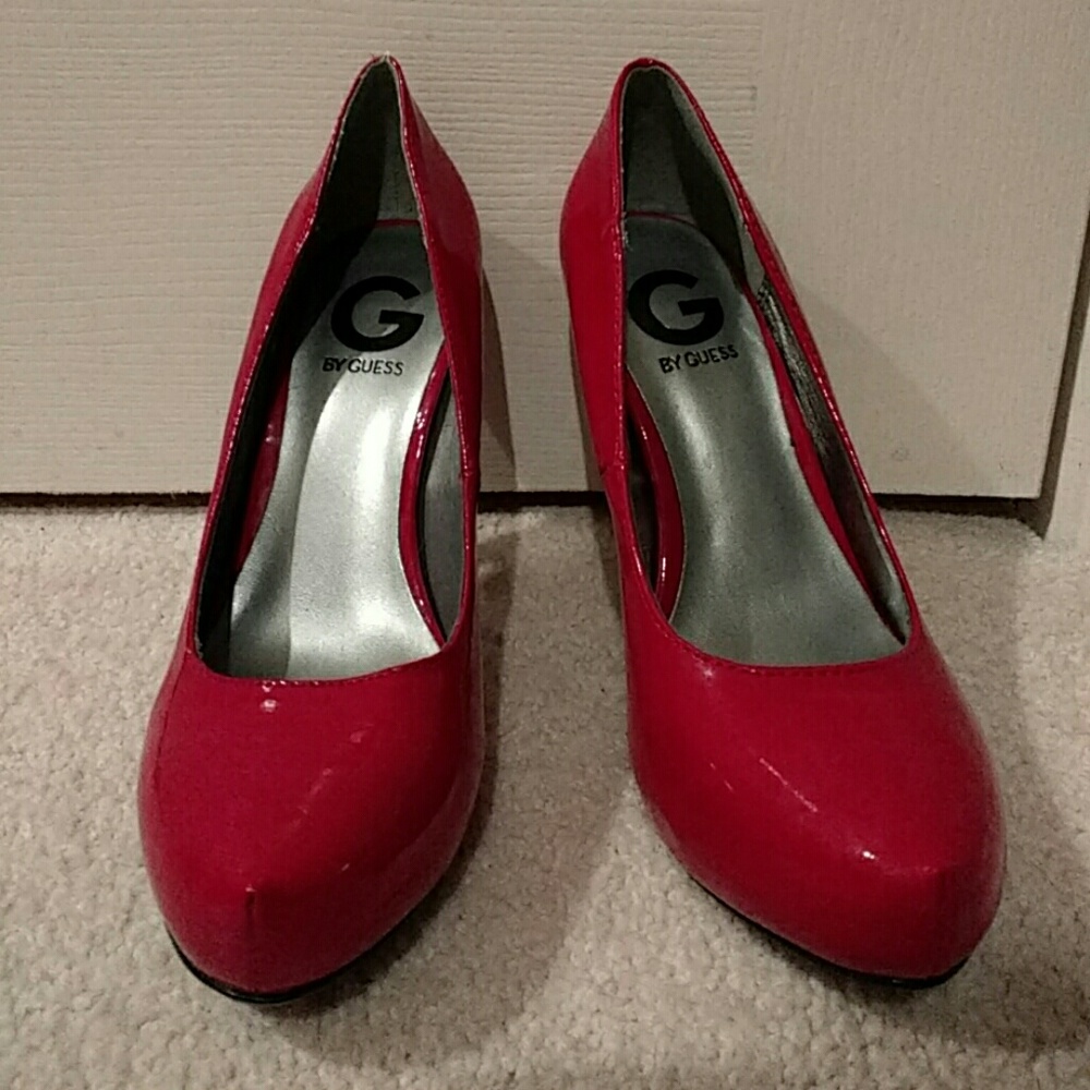 Guess red patent pumps