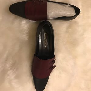 Rare Manolo Blahnik flats. Black and Burgundy.