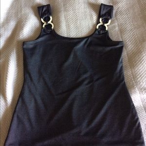 Tank top with white pinstripes and metal accent.