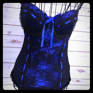 Royal blue and black lace up back corset.