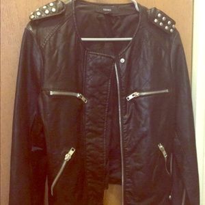 Black pleather jacket with silver details.