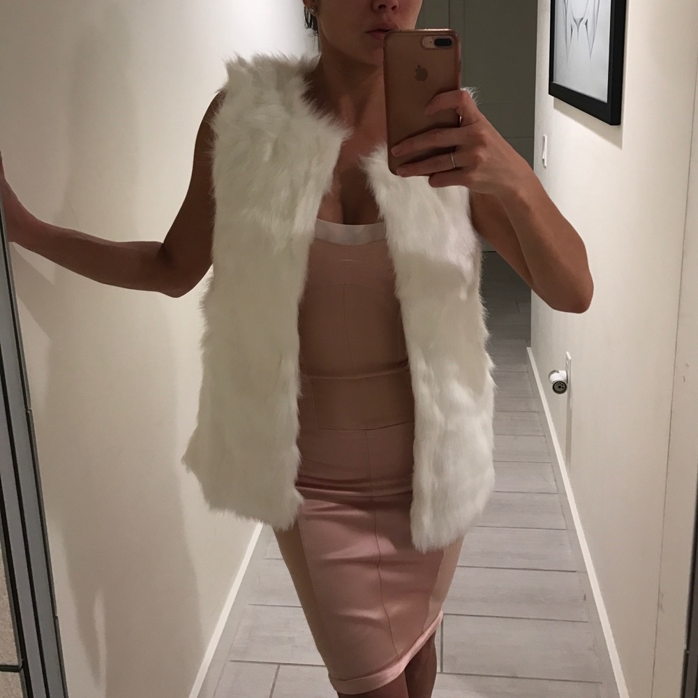 White faux fur vest