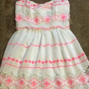Strapless white dress.