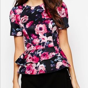 Peplum top with bonded hem in floral