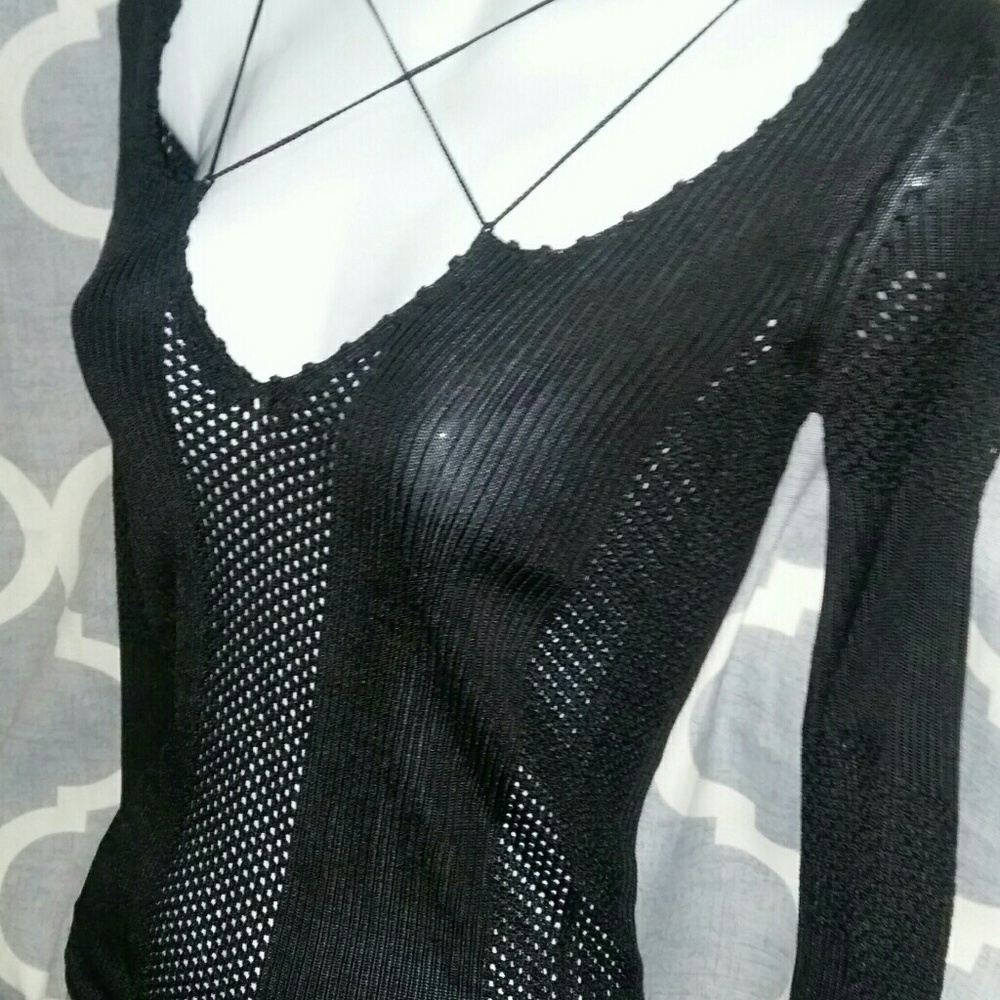 Armani Exchange top crouched